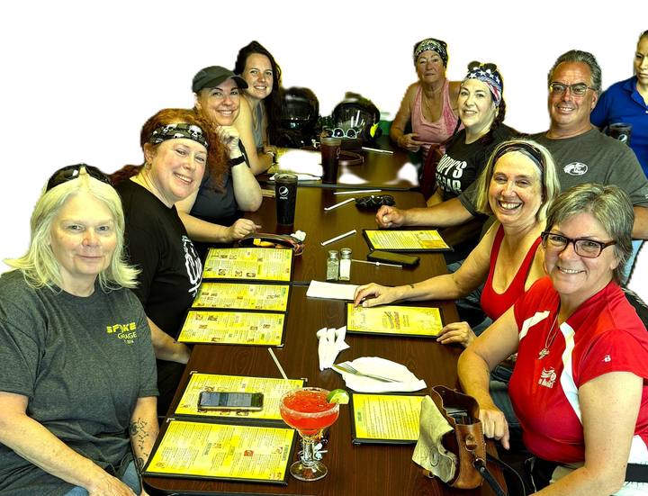 Members around a restaurant table at the June 2024 ride to lunch